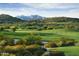 Picturesque golf course with desert landscape and mountains at 17842 W Chuckwalla Canyon Rd, Goodyear, AZ 85338