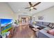 Open living area with hardwood floors and view of the kitchen at 17842 W Chuckwalla Canyon Rd, Goodyear, AZ 85338