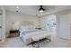 Well-lit main bedroom with modern chandelier and decorative bedside lighting at 18 W Kaler Dr, Phoenix, AZ 85021