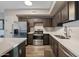 Bright kitchen featuring stainless steel appliances and a sink below the window at 18250 N Cave Creek Rd # 180, Phoenix, AZ 85032