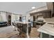 Modern kitchen featuring stainless steel appliances, a kitchen island, and sleek countertops at 18250 N Cave Creek Rd # 180, Phoenix, AZ 85032