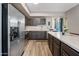 Bright kitchen featuring stainless steel appliances and a kitchen island at 18250 N Cave Creek Rd # 180, Phoenix, AZ 85032