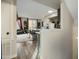 Open floor plan shows a kitchen island with bar stools, and a view into the adjacent living room at 18250 N Cave Creek Rd # 180, Phoenix, AZ 85032