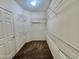 Large walk-in closet with ample shelving and hanging space at 18328 N Avalon Ln, Surprise, AZ 85374