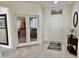 Light and airy entryway with access to the home office at 18328 N Avalon Ln, Surprise, AZ 85374