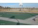 Community basketball court with clearly marked lines at 19601 N Krupps Ct, Maricopa, AZ 85138