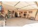 Large garage with ample storage space and shelving at 19601 N Krupps Ct, Maricopa, AZ 85138