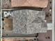 Aerial shot of a home with desert landscaping and block wall fencing at 2022 W Briana Way, Queen Creek, AZ 85144