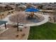 This neighborhood park features covered playground equipment and walking trails at 2022 W Briana Way, Queen Creek, AZ 85144