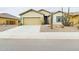 Charming single-story home featuring desert landscaping and a two-car garage at 2022 W Briana Way, Queen Creek, AZ 85144