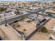 Aerial view of a house with solar panels and a large backyard at 203 E Beech Ave, Casa Grande, AZ 85122