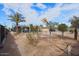 Backyard view, showing the house and gate at 203 E Beech Ave, Casa Grande, AZ 85122