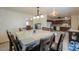 Dining area with a wooden table and kitchen view at 203 E Beech Ave, Casa Grande, AZ 85122