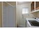 Laundry room with washer, dryer, and cabinets at 203 E Beech Ave, Casa Grande, AZ 85122