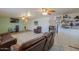 Living room with brown leather furniture and a home bar at 203 E Beech Ave, Casa Grande, AZ 85122