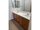 Double sink bathroom vanity with wood cabinets at 205 N 74Th St # 205, Mesa, AZ 85207