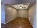 Simple bedroom with hardwood floors and ceiling fan at 205 N 74Th St # 205, Mesa, AZ 85207