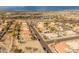 Aerial view of a residential neighborhood with houses and pools at 20967 N 96Th Ln, Peoria, AZ 85382