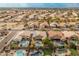 Aerial view of neighborhood with houses and pools at 20967 N 96Th Ln, Peoria, AZ 85382