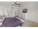 Spacious bedroom with ensuite bathroom access and a large walk-in closet at 20967 N 96Th Ln, Peoria, AZ 85382