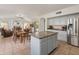 Spacious kitchen with island, stainless steel appliances, and gray cabinets at 20967 N 96Th Ln, Peoria, AZ 85382