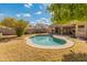 Relaxing kidney-shaped pool and grassy backyard at 20967 N 96Th Ln, Peoria, AZ 85382