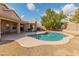 Inviting kidney-shaped pool with large backyard at 20967 N 96Th Ln, Peoria, AZ 85382