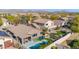 Aerial view of the house and neighborhood, highlighting the backyard pool at 2227 W Calle Del Sol --, Phoenix, AZ 85085