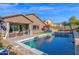 Inviting backyard oasis with a sparkling pool, spa, and ample lounge space at 2227 W Calle Del Sol --, Phoenix, AZ 85085