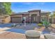 Single-story home with desert landscaping and a two-car garage at 2227 W Calle Del Sol --, Phoenix, AZ 85085