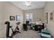 Home office with a desk, exercise bike, and printer at 2227 W Calle Del Sol --, Phoenix, AZ 85085