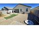 Unfinished backyard with gravel and partial sod at 24646 N Barley Rd, Florence, AZ 85132