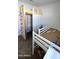 bedroom with a loft bed and a climbing wall at 24646 N Barley Rd, Florence, AZ 85132