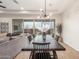 Dining area with a dark wood table and six chairs at 2485 S Quaintance St, Gilbert, AZ 85295