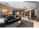 Sophisticated living room featuring a stylish mid-century modern sofa and coffee table at 25150 N Windy Walk Dr # 11, Scottsdale, AZ 85255