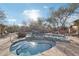 Community pool and spa with lounge chairs and desert landscaping at 25150 N Windy Walk Dr # 11, Scottsdale, AZ 85255