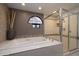 Large walk-in shower with glass enclosure at 25150 N Windy Walk Dr # 11, Scottsdale, AZ 85255