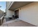 Patio with wicker furniture and patterned rug at 2524 S El Paradiso -- # 121, Mesa, AZ 85202