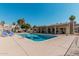 Inviting community pool with surrounding patio and lounge chairs at 2524 S El Paradiso -- # 121, Mesa, AZ 85202