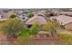 Aerial view of house and backyard with turf at 27573 N 174Th Dr, Surprise, AZ 85387