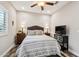 Bedroom featuring a TV and a comfy bed at 27573 N 174Th Dr, Surprise, AZ 85387