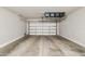 Clean and spacious two-car garage with overhead storage at 27573 N 174Th Dr, Surprise, AZ 85387