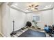 Bright home gym with various exercise equipment at 27573 N 174Th Dr, Surprise, AZ 85387