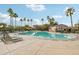 Inviting community swimming pool with lounge chairs at 27573 N 174Th Dr, Surprise, AZ 85387