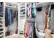 Well-organized closet with ample shelving, hanging racks, and storage space at 2808 N Granite Reef Rd, Scottsdale, AZ 85257