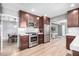 Well-equipped kitchen featuring stainless steel appliances, stylish cabinets, and bright countertops at 2808 N Granite Reef Rd, Scottsdale, AZ 85257