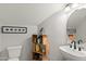 Modern bathroom with a white sink and gray tile at 2822 E Clifton Ct, Gilbert, AZ 85295