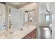 Double vanity bathroom with wood cabinets and mirrors at 2822 E Clifton Ct, Gilbert, AZ 85295