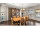 Bright dining room with a wooden table and access to the backyard at 2822 E Clifton Ct, Gilbert, AZ 85295