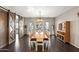 Bright dining room featuring a large table and barn doors at 2822 E Clifton Ct, Gilbert, AZ 85295